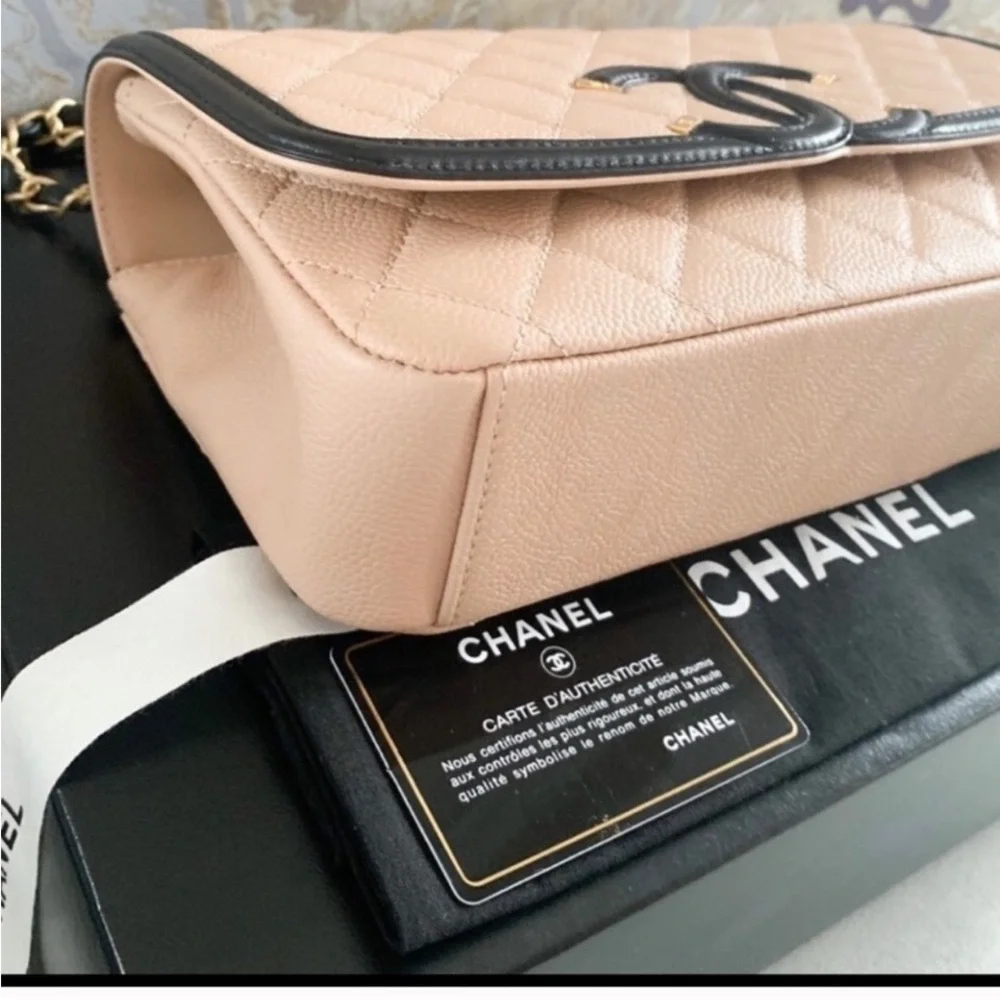 Authentic Chanel Medium Filagree Quilted Leather Bag
